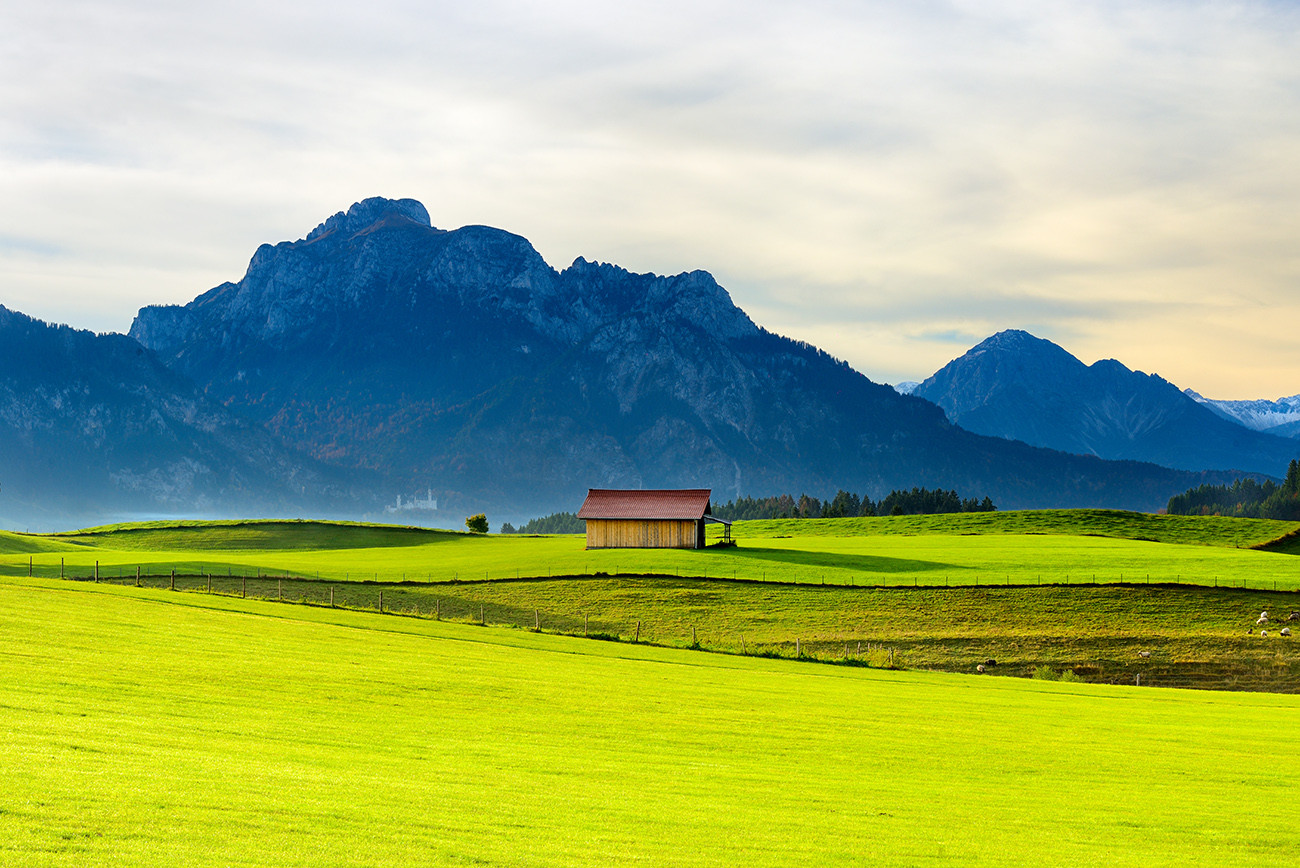 Castelos e Montanhas em um Porsche